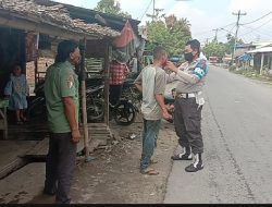 Hadapi NEW NORMAL, personil polres binjai bagikan masker dan beri himbauan kepada warga