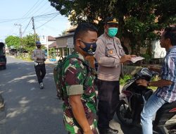 Polsek Sei Bingai Laksanakan Operasi Yustisi Dan Bagi Masker Gratis