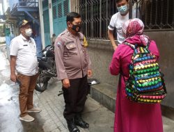 Bhabinkamtibmas Pekan Binjai Dampingi Tim Kesehatan Laksanakan Tracing