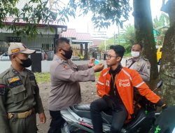 Polsek Binjai Kota Dengan Instansi Terkait Gelar Yustisi Pagi Tertibkan Warga Pakai Masker