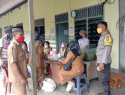 Polsek Selesai Laksanakan Pengamanan Monitoring Pelaksanaan Vaksinasi Di Desa Mancang Kec. Selesai