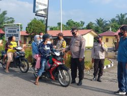 Operasi Yustisi Rutin Pagi Depan Mako Polsek Sei Bingai Tertibkan Warga Pakai Masker