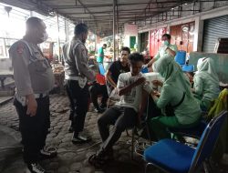 Kapolsek Binjai Utara Pimpin Langsung Pelaksanaan Vaksinasi Gebyar Target 1 Juta Vaksin Di Pasar Kebun Lada