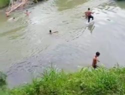 Polsek Selesai Polres Binjai Bersama Masyarakat Evakuasi Korban Tenggelam di Sungai Kw.Begumit