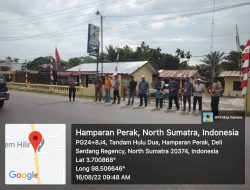 MENYAMBUT POLSEK BINJAI BERSAMA FORKOPIMCA BAGIKAN BENDERA MERAH PUTIH KEPADA PENGGUNA JALAN