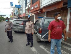 Cegah Penyebaran Covid-19, Polsek Binjai Kota Bagikan Masker Kepada Warga