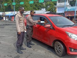 Polsek Binjai Timur lakukan himbauan protokol kesehatan beserta  membagikan masker gratis