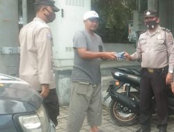 Program Himbauan pemerintah mengenai pendisplinan pencegahan virus corona oleh Polsek Binjai Timur serta memberikan masker secara gratis
