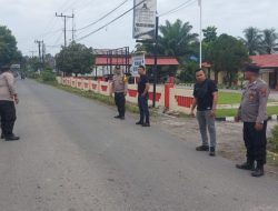 Petugas Polsek Sei Bingai laksanakan program Oprasi Yustisi pencegahan virus corona serta bagi masker secara gratis kepada masyarakat